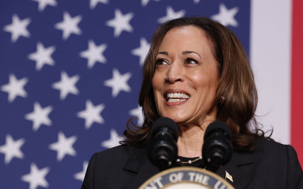 (FILES) Vice President Kamala Harris speaks during a political event at the Air Zoo Aerospace & Science Experience in Portage, Michigan, on July 17, 2024. Joe Biden on July 21, 2024 dropped out of the US presidential election and endorsed Vice President Kamala Harris as the Democratic Party's new nominee, in a stunning move that upends an already extraordinary 2024 race for the White House. Biden, 81, said he was acting in the "best interest of my party and the country" by bowing to weeks of pressure after a disastrous June debate against Donald Trump stoked worries about his age and mental fitness. (Photo by JEFF KOWALSKY / AFP)