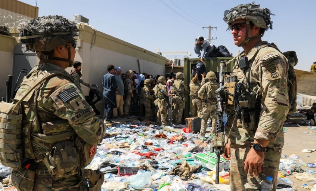 U.S soldiers from the XVIII Airborne Corps in  position guarding the at Hamid Karzai International Airport in Kabul, Afghanistan, on Aug 27, 2021.