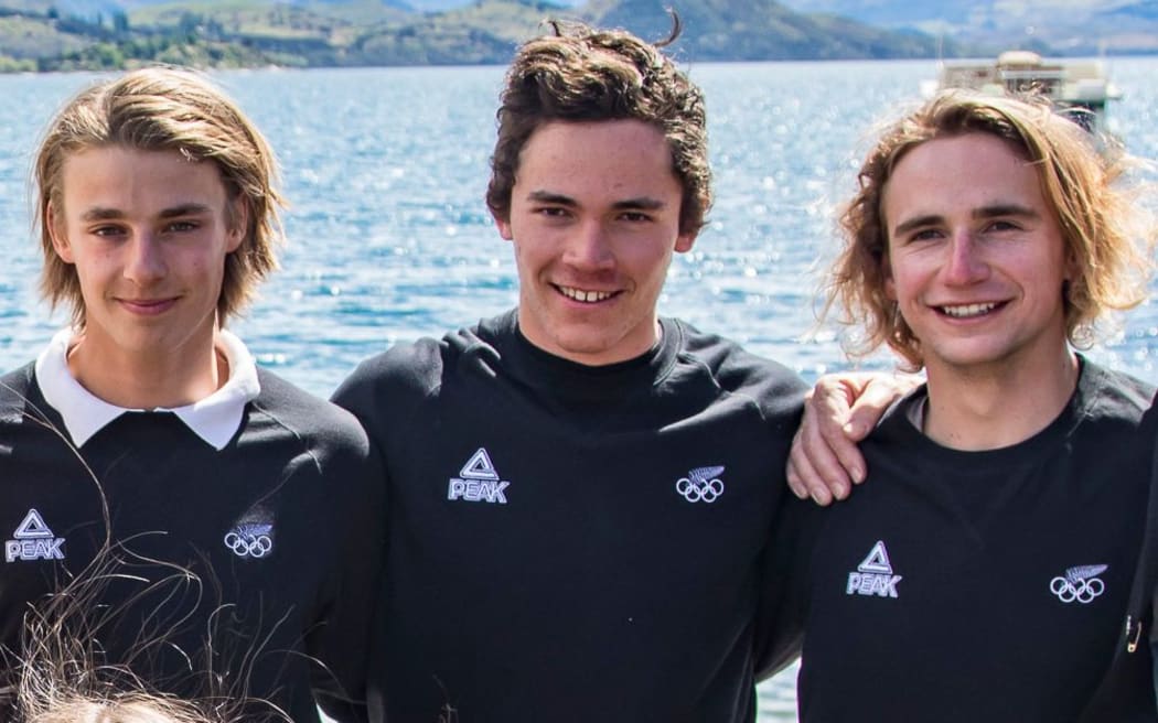 New Zealand snowboarder Tiarn Collins, centre, has been forced to bring an early end to his 2018 Winter Olympics campaign.