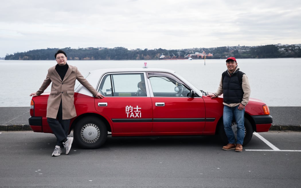 Hong Kong taxi. Michael Choi (left) and Peter Saengdee (right)