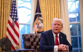 US President Donald Trump speaks to journalists in the Oval Office of the White House in Washington, DC, on January 30, 2025.