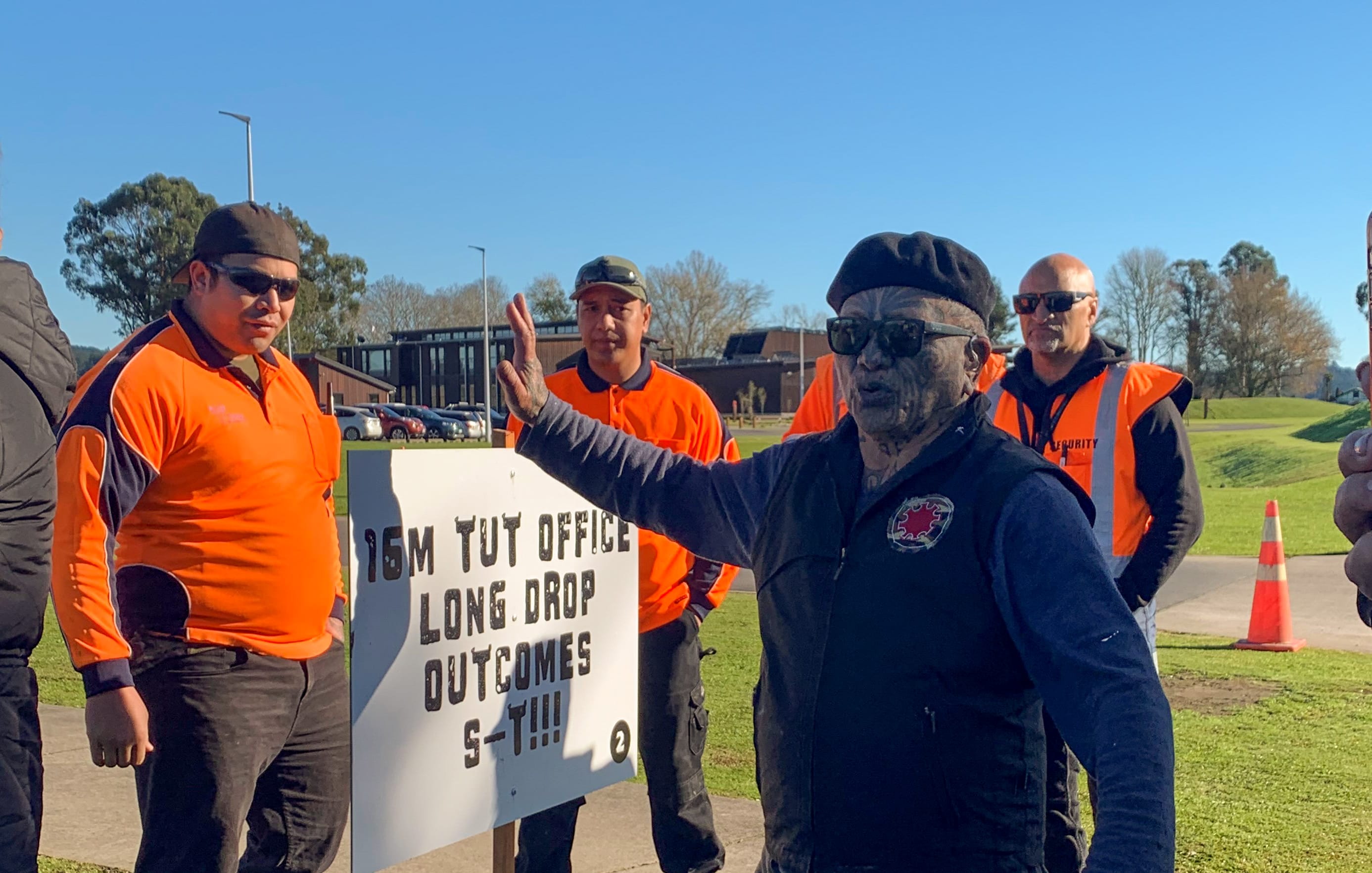 Tuhoe artist Tame Iti dismisses security guards after a tense discussion over people’s right to protest.