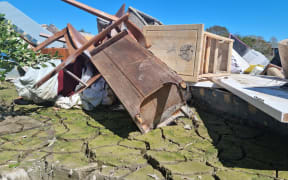 Furniture destroyed in Cyclone Gabrielle piled up in McLeod Road Awatoto, Napier.