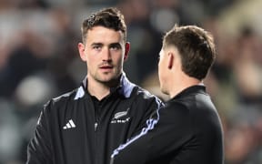 Will Jordan talks to Cam Roigard during the Second Test of the 2024 Steinlager Ultra Low Carb Series between the New Zealand All Blacks and England at Eden Park in Auckland, New Zealand on Saturday July 13, 2024. Copyright photo: Aaron Gillions / www.photosport.nz