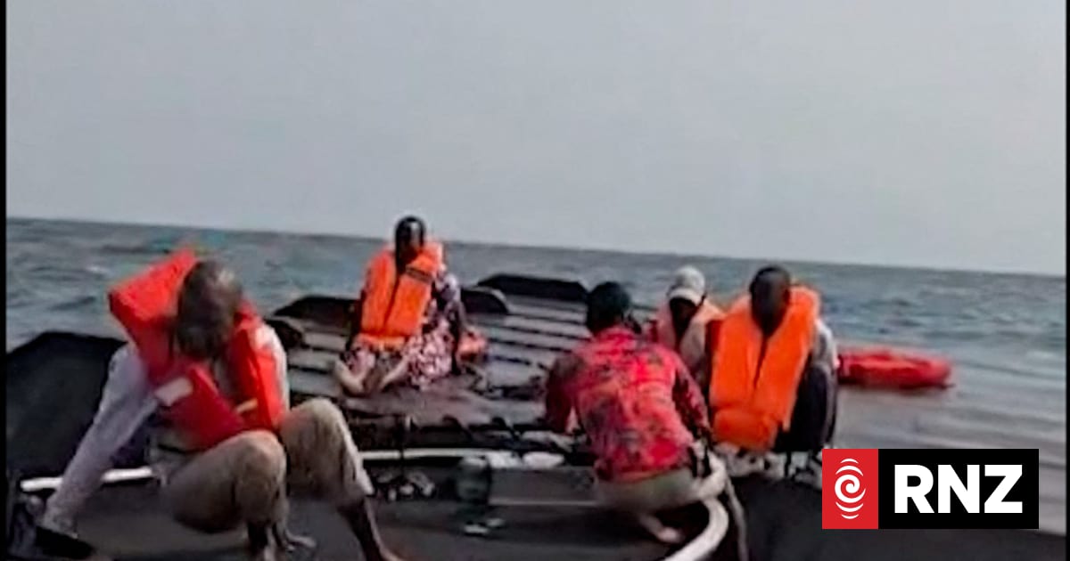 This UGC image, verified by AFP on August 12, 2026, shows passengers being rescued after a boat capsized on Zimbabwe’s Lake