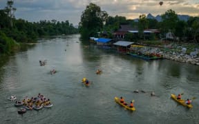 Vang Vieng, a popular backpacker destination in northern Laos, is at the centre of an unfolding tragedy after multiple people died from suspected methanol poisoning.