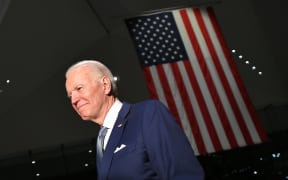 Democratic presidential hopeful former Vice President Joe Biden walks out after speaking at the National Constitution Center in Philadelphia.