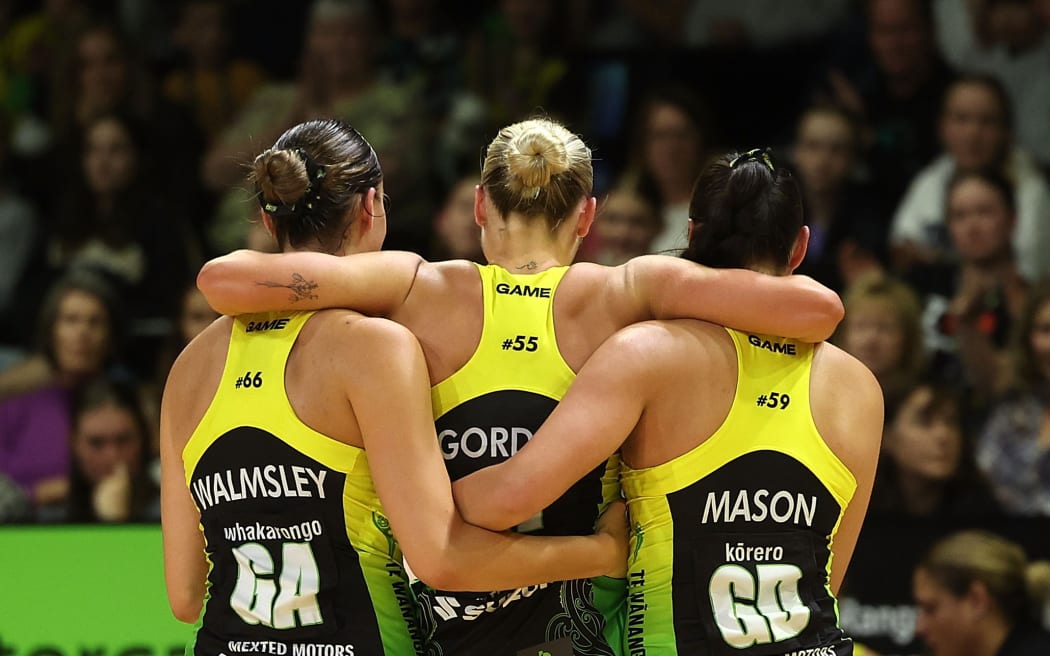Pulse's Maddy Gordon (C is carried from the caught by team mates Amelia Walmsley (L) and Parris Mason (R after being injured during the ANZ Premiership Wellington Pulse vs Steel netball match at the TSB Arena in Wellington. 28 April 2024. © Copyright image by Marty Melville / www.photosport.nz
