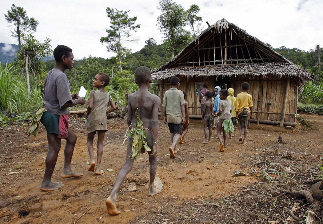 Children of the Andai tribe attend the single-room Lutheran school in Kaiam village in the remote East Sepik province of Papua New Guinea, 05 July 2007.