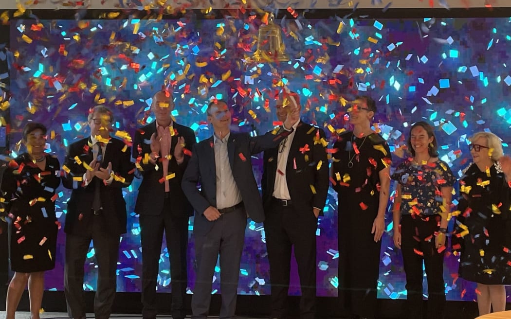 Ampol chief executive Matt Halliday rings NZX bell