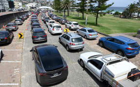 Residents queue up inside their cars for PCR tests at the St Vincent's Bondi Beach Covid-19 drive through testing clinic.