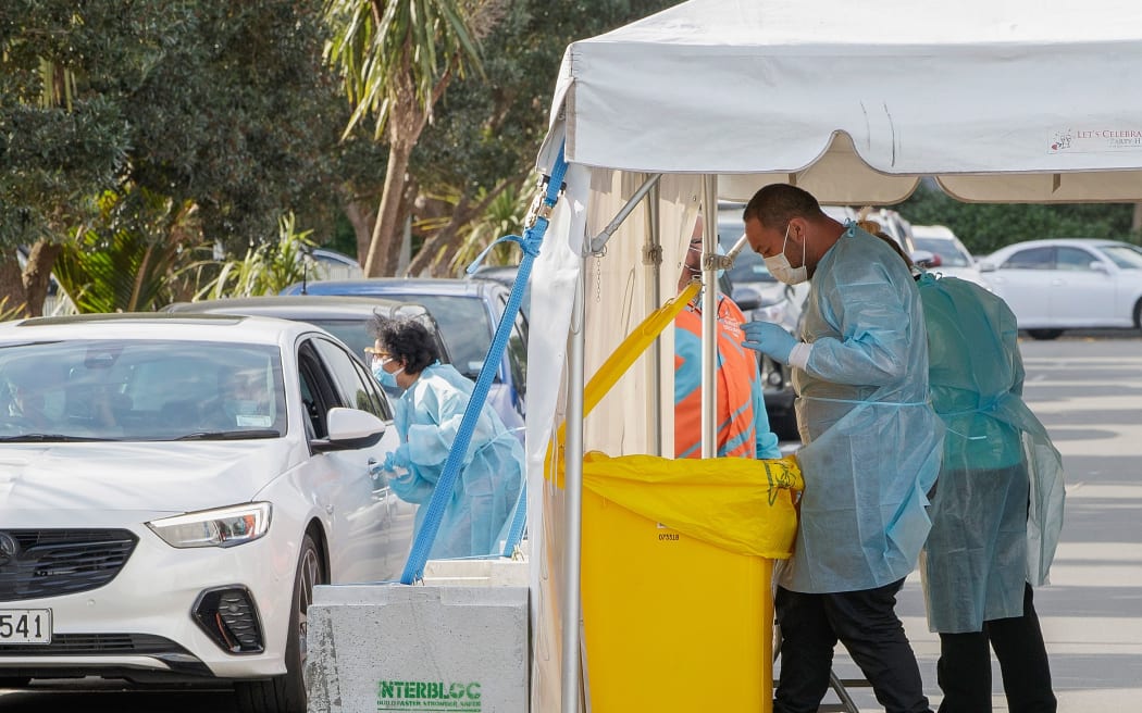 Testing being conducted by health workers at a COVID-19 testing station setup at Eden Park, National Sports Stadium, in Auckland on August 14, 2020.