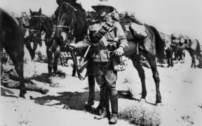 Member of the Australian 2nd Light Horse on active duty in the Middle East, ca. 1917 Unidentified soldier leading his horse.