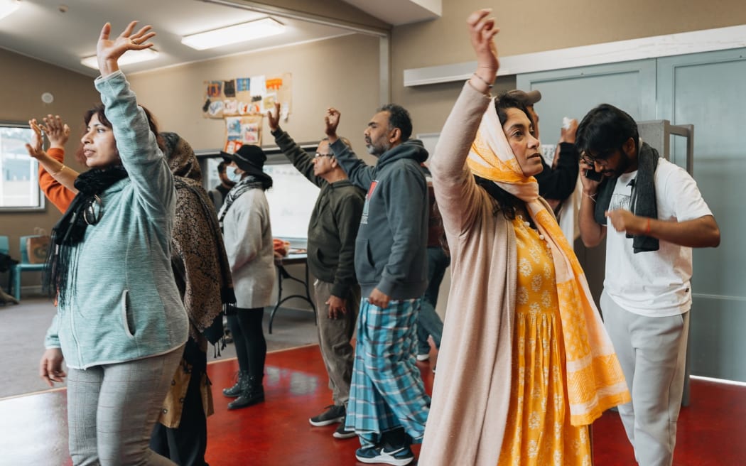 Members of the Probasee Bengali Association of New Zealand take part in a rehearsal for a play titled "Awghoton ... Aajo Ghote". Photo Credit: Swayam Sarkar SINGLE USE ONLY!
