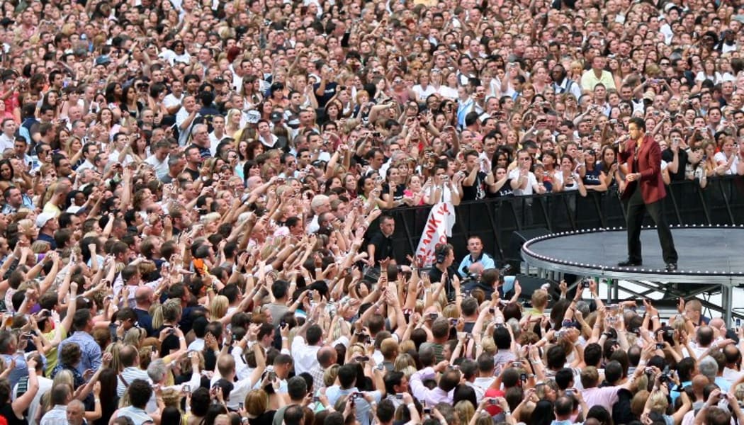 George Michael performs at Wembley in 2007.