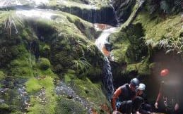 A group of emergency services conduct a practice rescue mission at a canyon.