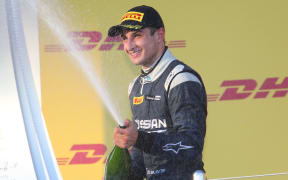 Mitch Evans celebrates on the Russian podium