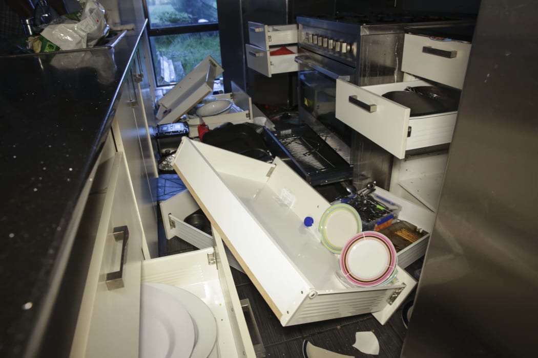 The kitchen contents emptied onto the floor.