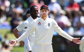 England captain Joe Root questions the umpire.