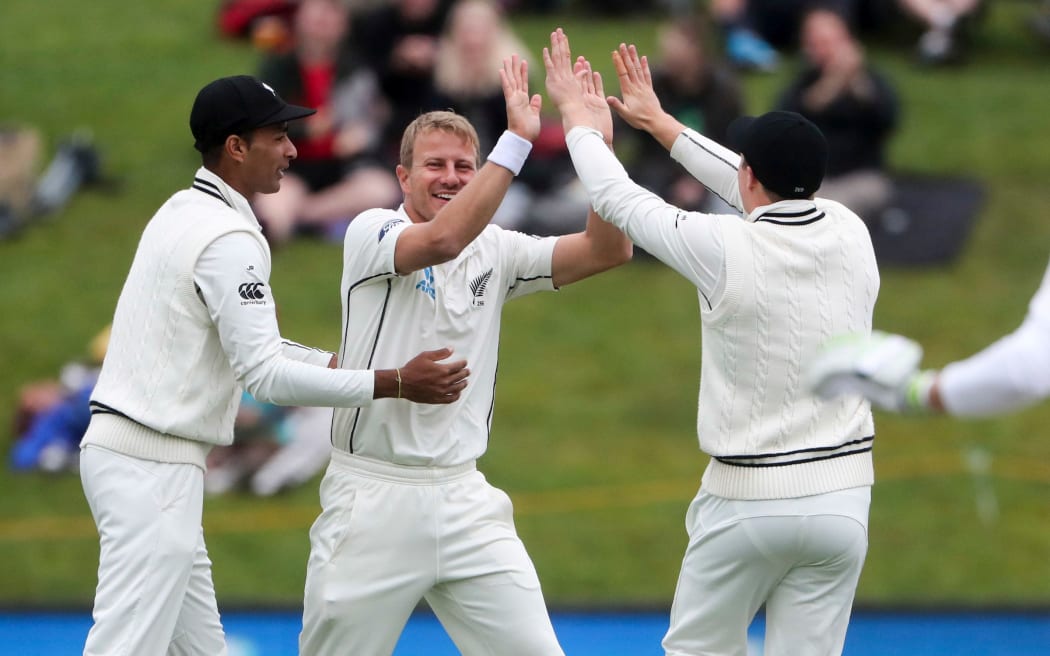 Neil Wagner celebrates the first wicket of the day.