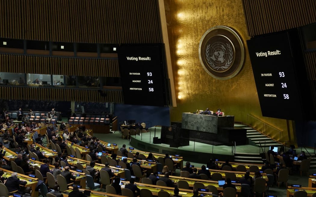 The board showing the passage of the resolution during a UN General Assembly vote on a draft resolution seeking to suspend Russia from the UN Human Rights Council in New York City on 7 April 2022.