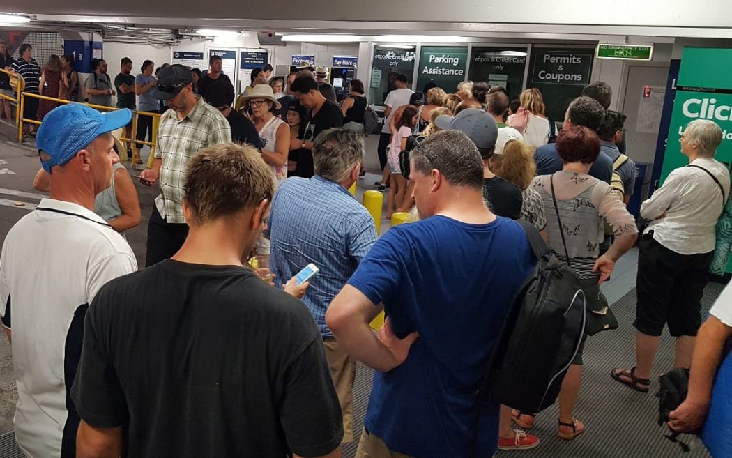 Lengthy queues at all pay stations after Saturday's waterfront concert caused AT to raise barrier arms and let visitors leave without paying.