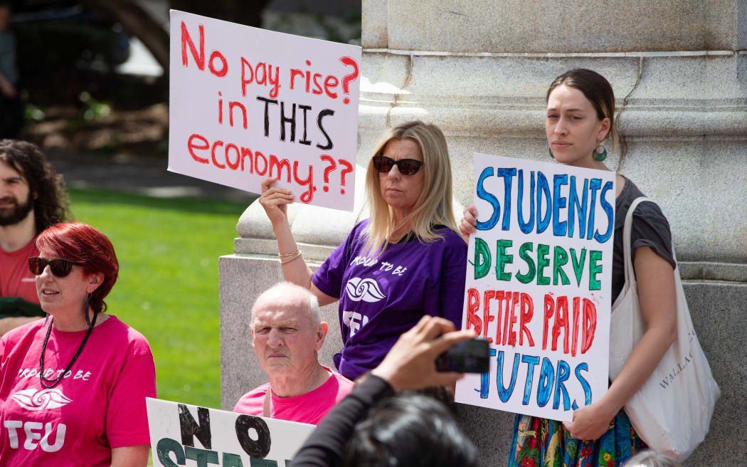 Members of the Tertiary Education Union protest outside Parliament