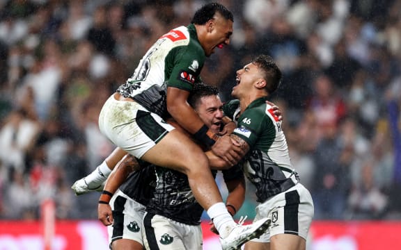 Kodi Nikorima of the Maori All Stars celebrates scoring a try with team mates during the NRL match between the Indigenous Men's All-Stars and Maori Men's All-Stars
