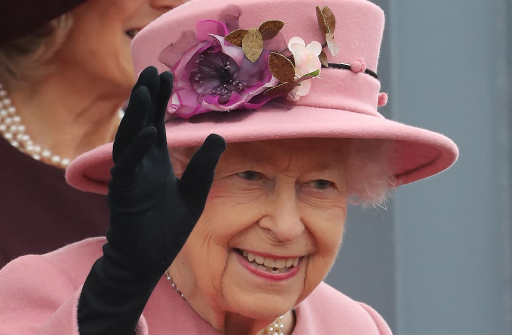 Queen Elizabeth II waves after attending the ceremonial opening of the sixth Senedd, in Cardiff, Wales on 14 October 2021.