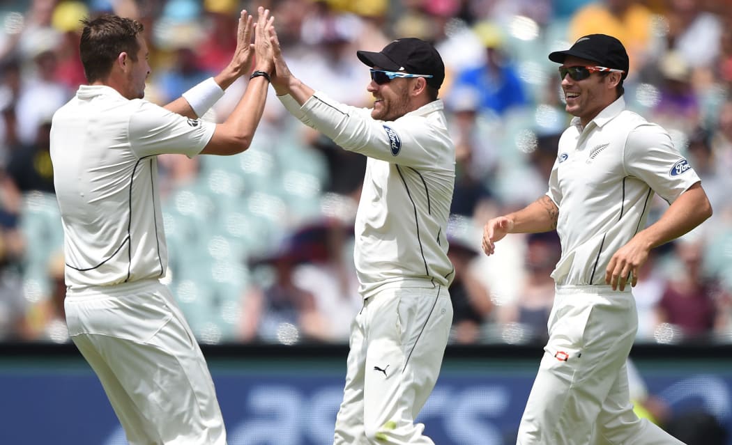 Tim Southee and Brendon McCullum celebrate the dismissal of Shaun Marsh, Adelaide, 2015.