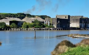 Derelict coolstores buildings on the banks of the Pātea River in Taranaki.