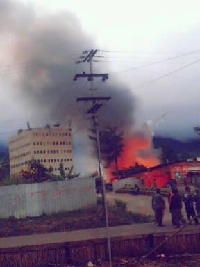 A building burns in Mendi during a period of political unrest.
