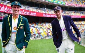 Australia's new captain Pat Cummins and England captain Joe Root at an Ashes presser at the Gabba in Brisbane.