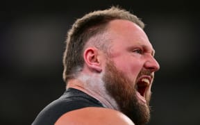 New Zealand's athlete Tom Walsh reacts after an attempt in the men's shot put final during the World Athletics Championships in Tokyo on September 13, 2025. (Photo by Ben STANSALL / AFP)