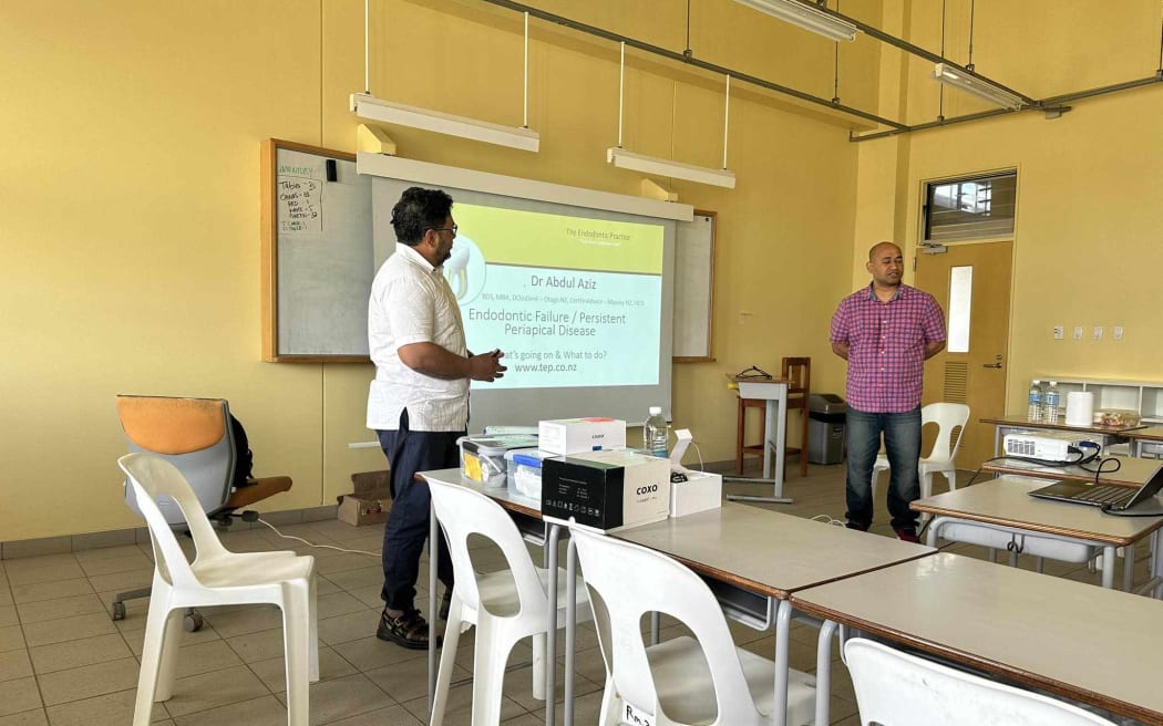 Dr Aziz (left) runs through procedure during the course.