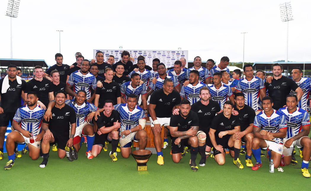 All Blacks and Samoa after New Zealand's victory at Apia Park.