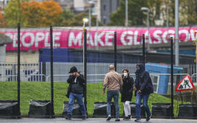 COP26 attendees arrive at the Scottish Event Campus.