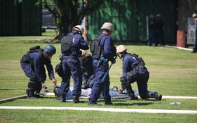 Solomon Islands Police put on public order management demonstration at GBR RAMSI base.