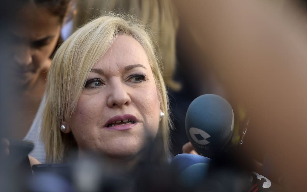 Ines Madrigal, who heads the Murcia branch of SOS Stolen Babies association, arrives at a provincial court in Madrid, on June 26, 2018 to appear in the first trial over thousands of suspected cases of babies stolen from their mothers during the Franco era.
 / AFP PHOTO / OSCAR DEL POZO