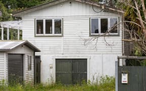 Houses in Candia Drive sit abandoned in November 2023 and have been subsequently vandalised since the floods at the start of 2023.