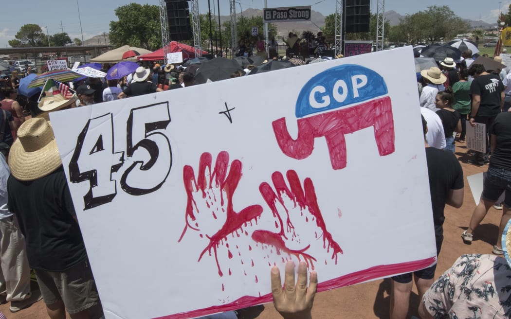 El Paso residents protest against the visit of US President Donald Trump to the city after the shooting that left 22 people dead.