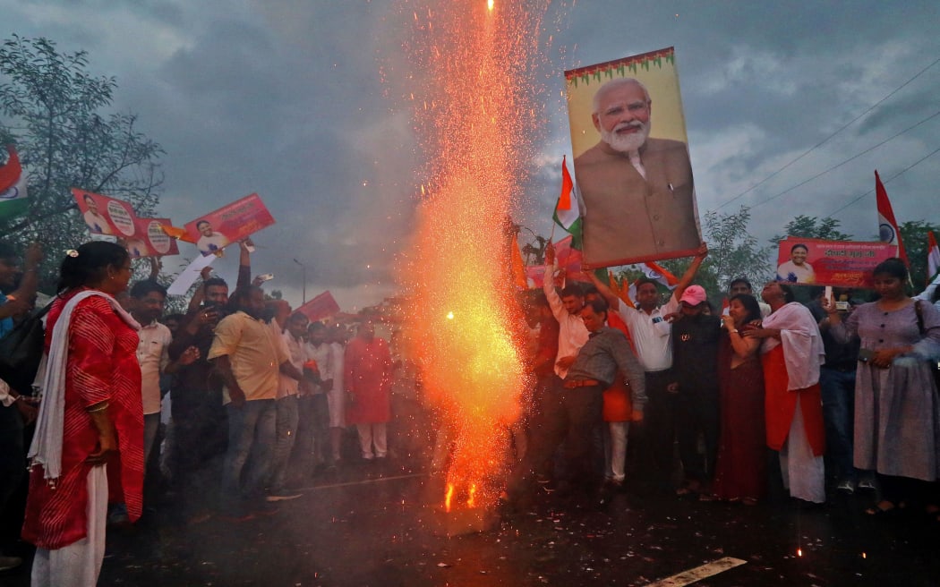Jaipur: BJP workers and supporters celebrate NDA's presidential candidate Droupadi Murmu's lead during counting of votes to elect the 15th President, in Jaipur, Rajasthan, India, Thursday, July 21, 2022. Murmu crossed the halfway mark and is set to be first tribal woman President of India.(Photo by Vishal Bhatnagar/NurPhoto) (Photo by Vishal Bhatnagar / NurPhoto / NurPhoto via AFP)