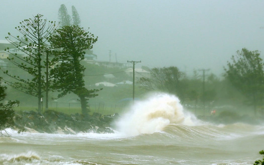 Waves crash into a breakwall after Tropical Cyclone Marcia made landfall in the coastal town of Yeppoon.