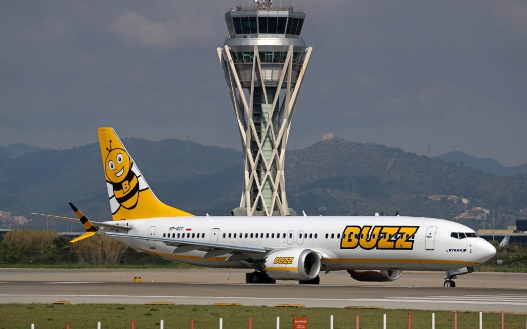 A Boeing 737 MAX 8-200 of Buzz company is preparing to take off on the runway of the Barcelona-El Prat Airport in Barcelona, Spain, on May 1, 2024. (Photo by Urbanandsport/NurPhoto) (Photo by Urbanandsport / NurPhoto / NurPhoto via AFP)
