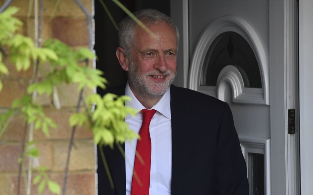 Britain's opposition Labour party Leader Jeremy Corbyn leaves his home in north London on June 9, 2017 after results in a snap general election suggest a hung parliament
