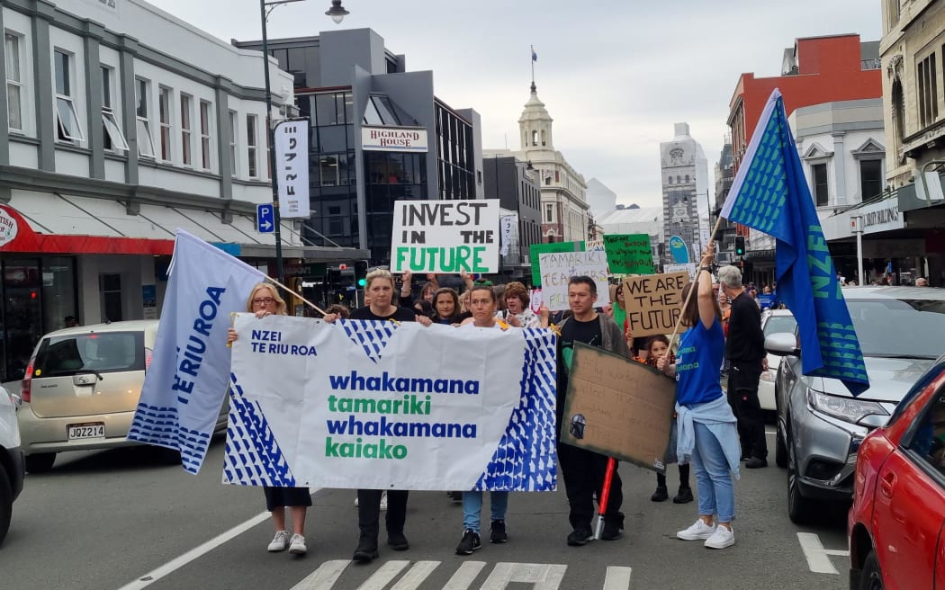 Teachers striking over pay and conditions march in Dunedin, 16 March 2023.