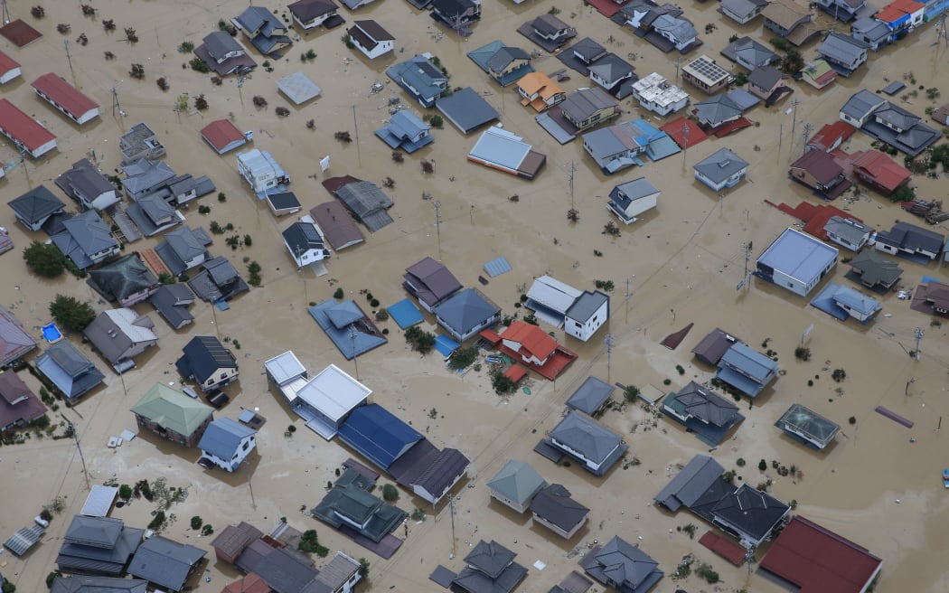 Residential area is covered with water as the banks of Chikuma river collapsed in Nagano city, Nagano prefecture on Oct. 13, 2019, one day after Typhoon No. 19, known as Typhoon Hagibis,