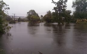 Parts of River Rd in Avonside submerged during last week's flood.