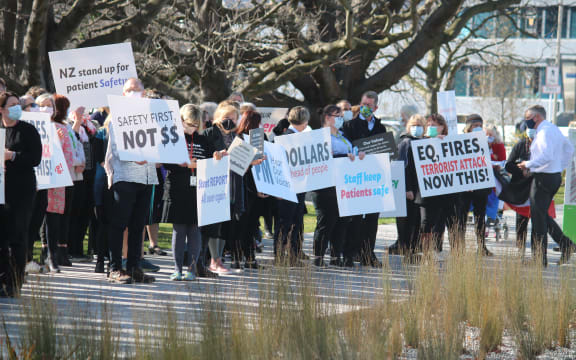 Protesters gather outside of the Canterbury Health Board corporate office on 20 August.