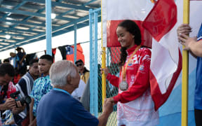 16-year old Deotille Videau during the Medal presentation after winning her seventh Gold medal for Tahiti.
